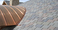 Upclose view of synthetic shingles on a Maryland home.