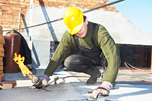 Burke, VA Roofing Contractor Repairing Roof