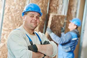 Clifton, VA insulation contractors installing attic insulation
