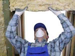 Dunn Loring, VA insulation contractor installing attic insulation