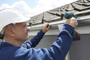 contractor performing an expert gutter repair in Lowes Island, VA