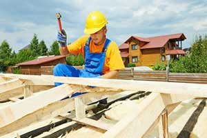 a roofing contractor building shingles for a Herndon, VA roof repair