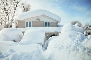 snow on roof causing it to cave in