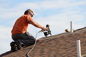 roof repair contractors performing a routine Fairfax, VA roof repair