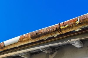 rusting metal of gutters in Fairfax, VA that will eventaully need a gutter repair