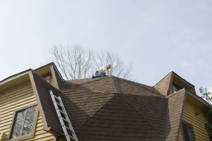 emergency roof repair being made in Fairfax, VA after a very powerful wind storm