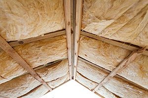 attic insulation made of fiberglass that is used to prevent the house form becoming too cold in the fall