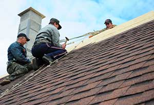 Northern Virginia roofing contractors working on a roof