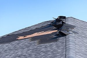 a damaged roof that has a few missing shingles and is therefore due for a Northern Virginia roof repair but does not need a replacement