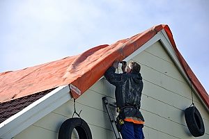 an emergency roof repair being done in Northern Virginia