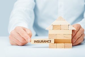 building blocks representing homeowners insurance for roof replacement
