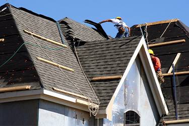 a roof that had shingles pulled off before a Northern Virginia roof replacement