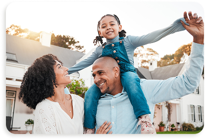 Family in front of home